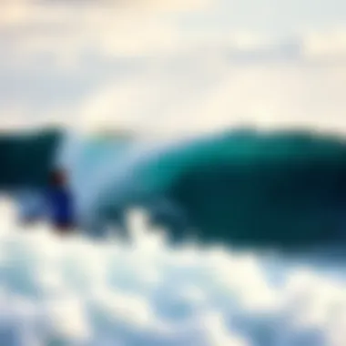 An aerial view of surfers catching waves at Jaws