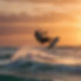 Cabrinha Contra kitesurfing in action against a vibrant sunset