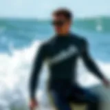 Surfing in Style: Catch Surf Wetsuit Performance Surf enthusiast showcasing a Catch Surf wetsuit in action