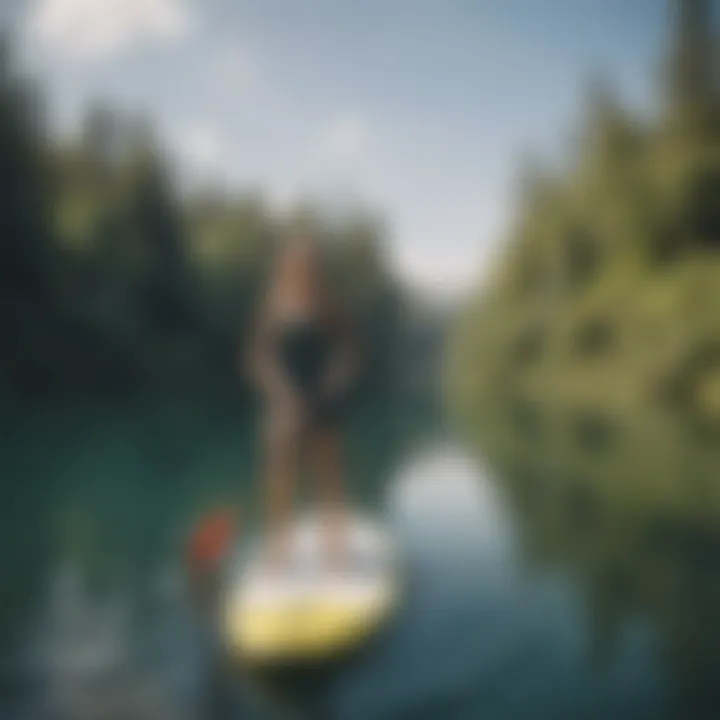 An instructor demonstrating proper paddle boarding techniques on a tranquil lake