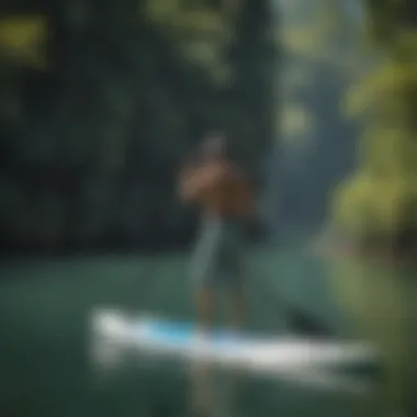 A paddleboarder practicing techniques in calm waters