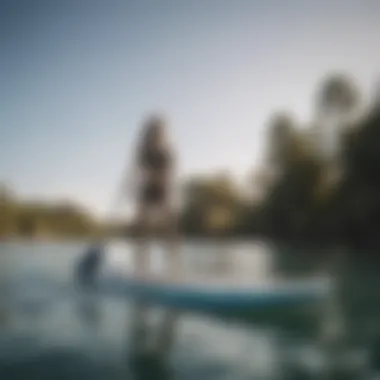 Demonstrating Stability on Paddle Board Rider demonstrating stability on a paddle board