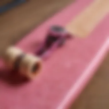 Close-up of a pink longboard showcasing its craftsmanship and detailing.