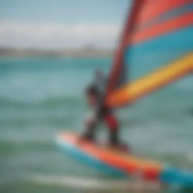 Close-up of windsurfing equipment showcasing the sail and board.