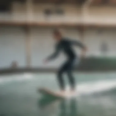 A beginner learning to balance on a surfboard indoors with a trainer