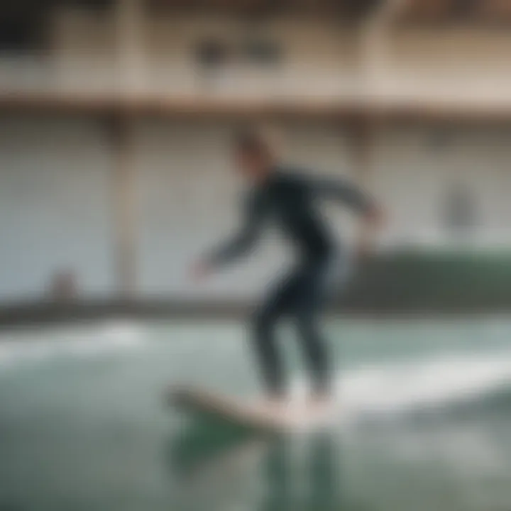 A beginner learning to balance on a surfboard indoors with a trainer