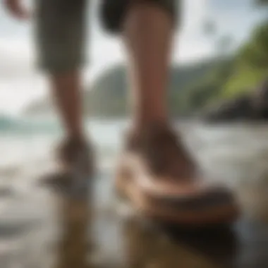 A pair of Olukai Hokua shoes by the water, showcasing their versatility