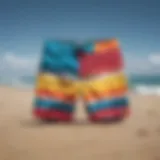 Vibrant Rip Curl board shorts displayed on a sandy beach