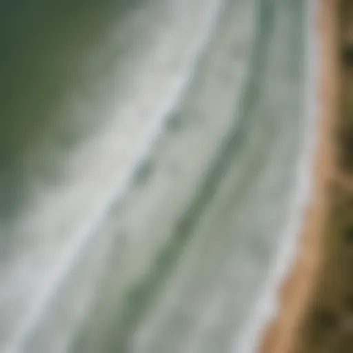 Aerial view of a Texas surf park showcasing artificial waves with surfers riding them.