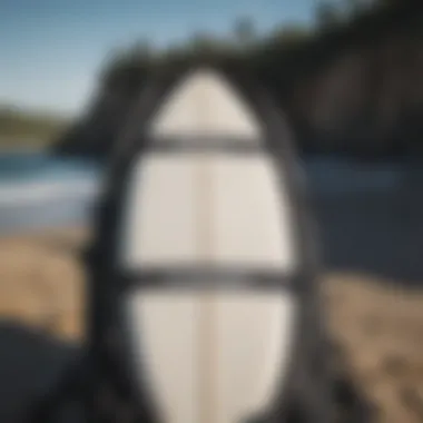 A Dakine surfboard bag being used for travel