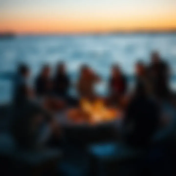 A diverse group of watersports enthusiasts sharing stories and laughter around a bonfire by the shore