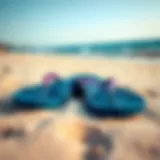 Reef Newport flip flops on sandy beach