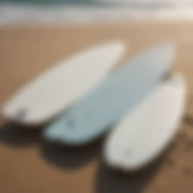 A comparison image showing a hard top surfboard next to a traditional foam board to highlight differences.