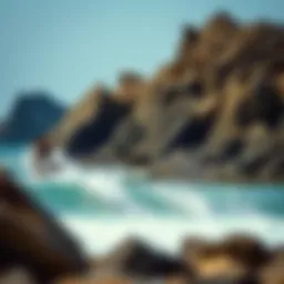 Dynamic skimboarding action on a rocky reef