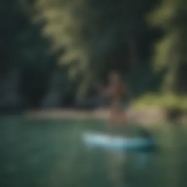 Participants engaging in paddleboarding during a camp session