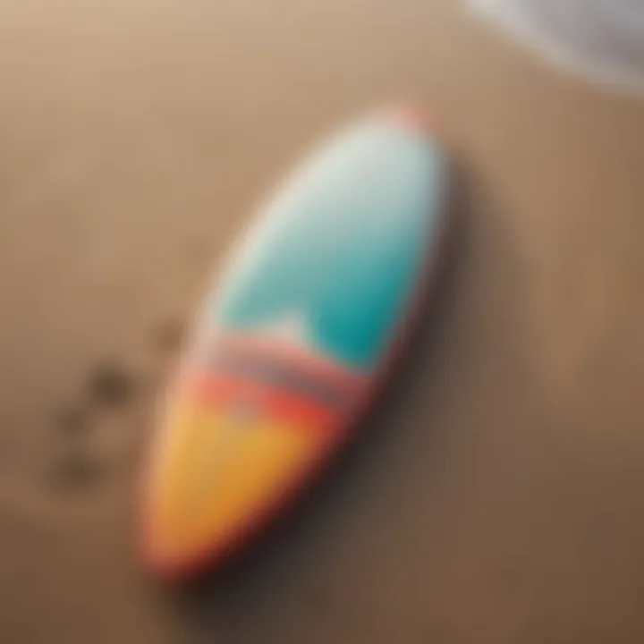 A beautifully designed surfboard resting on the beach