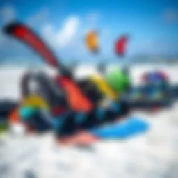 A colorful array of kite surfing gear displayed on a sandy beach