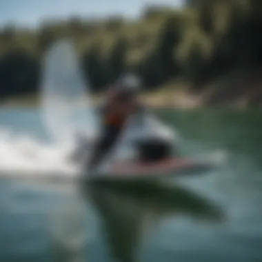 A rider skillfully maneuvering on the KT Wing Board during a sunny day