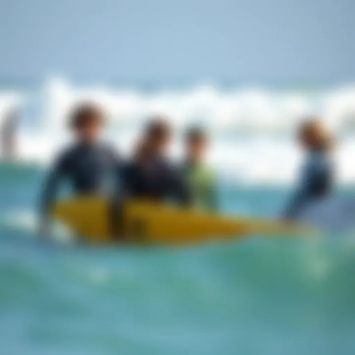 Surf Lesson at La Pointe Surf Camp Group of surfers engaged in a lesson at La Pointe Surf Camp