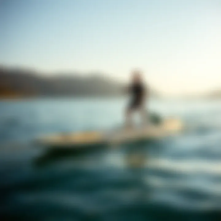 Performance in Action: Laird SUP Board A paddler gliding smoothly on a Laird SUP board on serene waters
