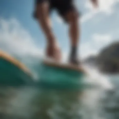 A close-up of the board and water during an ollie, illustrating the interaction.