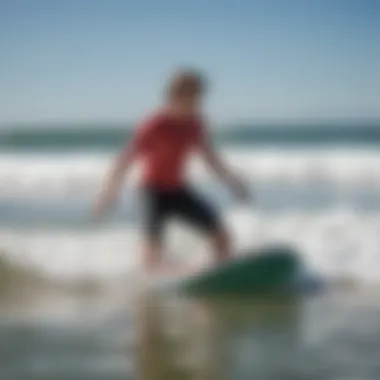 A novice rider enjoying their first experience on a boogie board in gentle waves