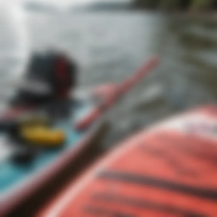 Close-up of essential paddleboarding gear laid out