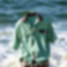 A vibrant Quiksilver collared shirt draped elegantly against a backdrop of ocean waves.