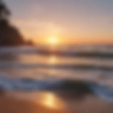 A serene beach at sunset with gentle waves lapping the shore