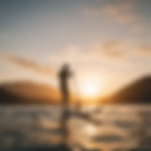 A scenic view of a standup paddle surfer gliding over calm waters at sunset.