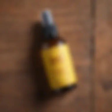 Ingredients of Sun Bum Oil Mist displayed on a wooden surface