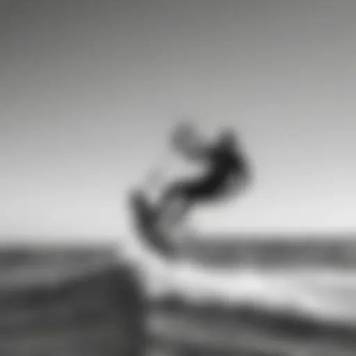 Dynamic duotone kitesurfing action on water