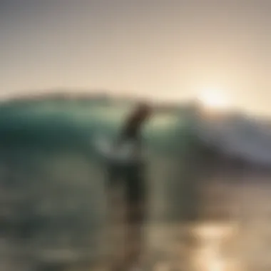A surfer catching a wave during sunset