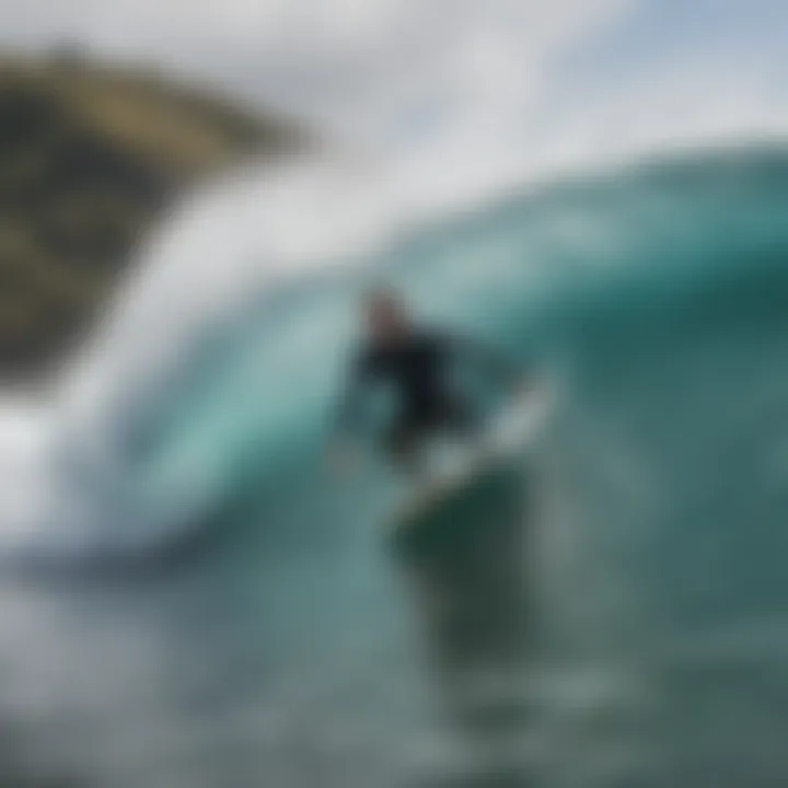 A surfer riding a wave under windy conditions