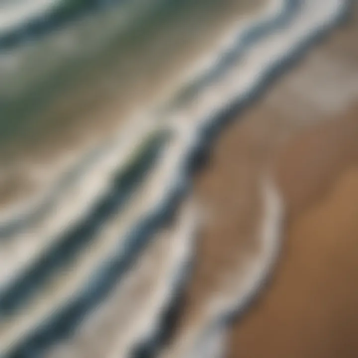 An aerial view of beach waves and coastal areas