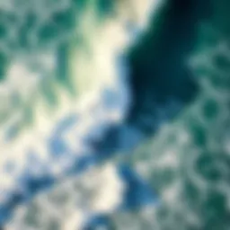 Aerial view of a vibrant surf break with waves crashing