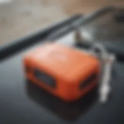 A close-up of a surf car key lock box mounted on a vehicle