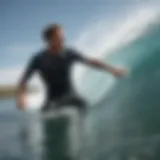 A surfer expertly riding a wave while wearing a wet shirt, showcasing technique and balance.